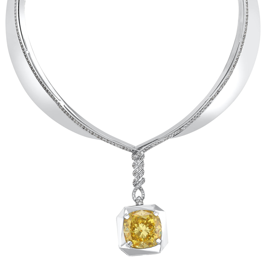 Choker necklace featuring a large yellow diamond set in a geometric frame
